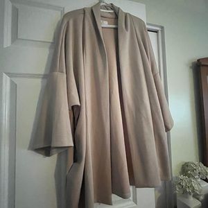 Hardly worn “scuba” material cardigan.